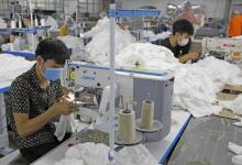 With a positive economic outlook and future opportunities, Vietnamese industries hope to reach ambitious export goals next year. (Photo: VNA)