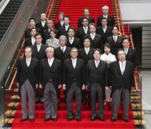 Japan's new Prime Minister Shigeru Ishiba (1st row, C) and his Cabinet members pose for a photo at the premier's office in Tokyo on Oct. 1, 2024, following the inauguration of his Cabinet. (Kyodo)