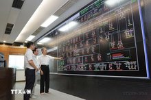 Managing and operating the power grid using information technology at the Ho Chi Minh City power system centre. (Photo: VNA)