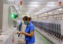 With certain advantages, Vietnam has been the destination for many multinational businesses to seek processors, and processing in turn have become a major growth engine of the economy (Illustrative photo: VNA)