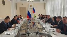 At the working session (Photo: VNA)