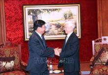 Top Lao leader meets with former Vietnamese Presidents