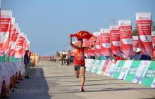Nearly 2,000 runners compete in the 61st Tien Phong Newspaper Marathon in Ly Son island, the south-central province of Quang Ngai on July 5. (Photo: VNA)