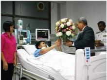 Sole survivor of chopper crash presented royal flower