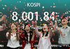 Employees take part in a ceremony at the dealing room of Hana Bank in Seoul on May 15, 2026, to celebrate the benchmark Korea Composite Stock Price Index having risen over the 8,000-point mark for the first time. (Yonhap)