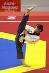 Jun Ha-eun of South Korea performs during the semifinal of the women's poomsae event in taekwondo at the Aichi-Nagoya Asian Games at Toyohashi Gymnasium in Toyohashi, Aichi Prefecture, central Japan, on Oct. 1, 2026. (Yonhap) (END)