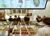 A participant places an order during a media showcase to launch the first Asian restaurant of the U.S. Mexican chain Chipotle in Seoul's Gangnam Ward on Sept. 1, 2026. (Yonhap) (END)