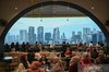 Visitors enjoy meals at a dining spot in Kuningan City Mall, Jakarta