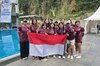Indonesian underwater hockey athletes pose for a group photo