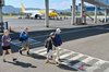 Several airline passengers walk upon arrival at Komodo Airport