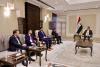 Deputy Prime Minister for Energy Affairs, Mohsen Al-Mandalawi, (right), a delegation from the American company KBR, led by its CEO, Jay Ibrahim (left) 