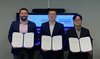 This undated photo provided by Hanwha Ocean Co. shows officials from Norway's DNV and Hanwha Ocean posing for a photo after signing a memorandum of understanding (MOU) during the Nor-Shipping 2025 conference in Oslo, Norway. (PHOTO NOT FOR SALE) (Yonhap)