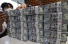 This undated file photo shows U.S. dollar bills. (Yonhap)