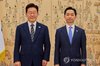 President Lee Jae Myung (L) and Kim Ji-yong, the inaugural chief of the Serious Crime Investigation Agency, pose for a photo during an appointment ceremony at Cheong Wa Dae on Oct. 19, 2026, in this photo provided by the presidential office. (PHOTO NOT FOR SALE) (Yonhap)