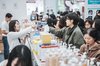 Visitors to the 13th Cosmetics & Beauty Expo Osong Korea in the central city of Cheongju check cosmetics products, in this photo provided by the North Chungcheong provincial government on Oct. 25, 2026. (PHOTO NOT FOR SALE) (Yonhap)