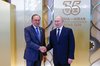 Prime Minister Datuk Seri Anwar Ibrahim (left) shakes hands with Russian President Vladimir Putin before the ASEAN-Russia Commemorative Summit Gala Dinner at the Gallery Area of the Tatar State Academic Theatre