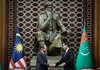 ASHGABAT (TURKMENISTAN), June 19 -- Prime Minister Datuk Seri Anwar Ibrahim (left) joins hands with Turkmenistan President Serdar Berdimuhamedov (right) at a joint press conference at the Presidential Palace here today.  --fotoBERNAMA (2026) COPYRIGHT RESERVED