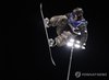 Lee Chaeun of South Korea competes in the men's halfpipe qualification at the Winter Olympics at Livigno Snow Park in Livigno, Italy, on Feb. 11, 2026. (Yonhap)