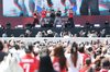 Football fans watch K-pop group Cortis' performance at Gwanghwamun Square in central Seoul before cheering for South Korea's national football team ahead of their match against Czechia starting at 11 a.m. on June 12, 2026. (Yonhap)