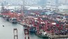 This file photo shows containers being stacked at a port in the southeastern port city of Busan on Oct. 1, 2026. (Yonhap)