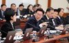 President Lee Jae Myung (2nd from L) speaks to Prime Minister Han Seong-sook (L) during a Cabinet meeting on Sept. 1, 2026. (Yonhap)