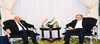 Iraqi FM, Fuad Hussein (left), his Iranian counterpart Abbas Araghchi (right)
